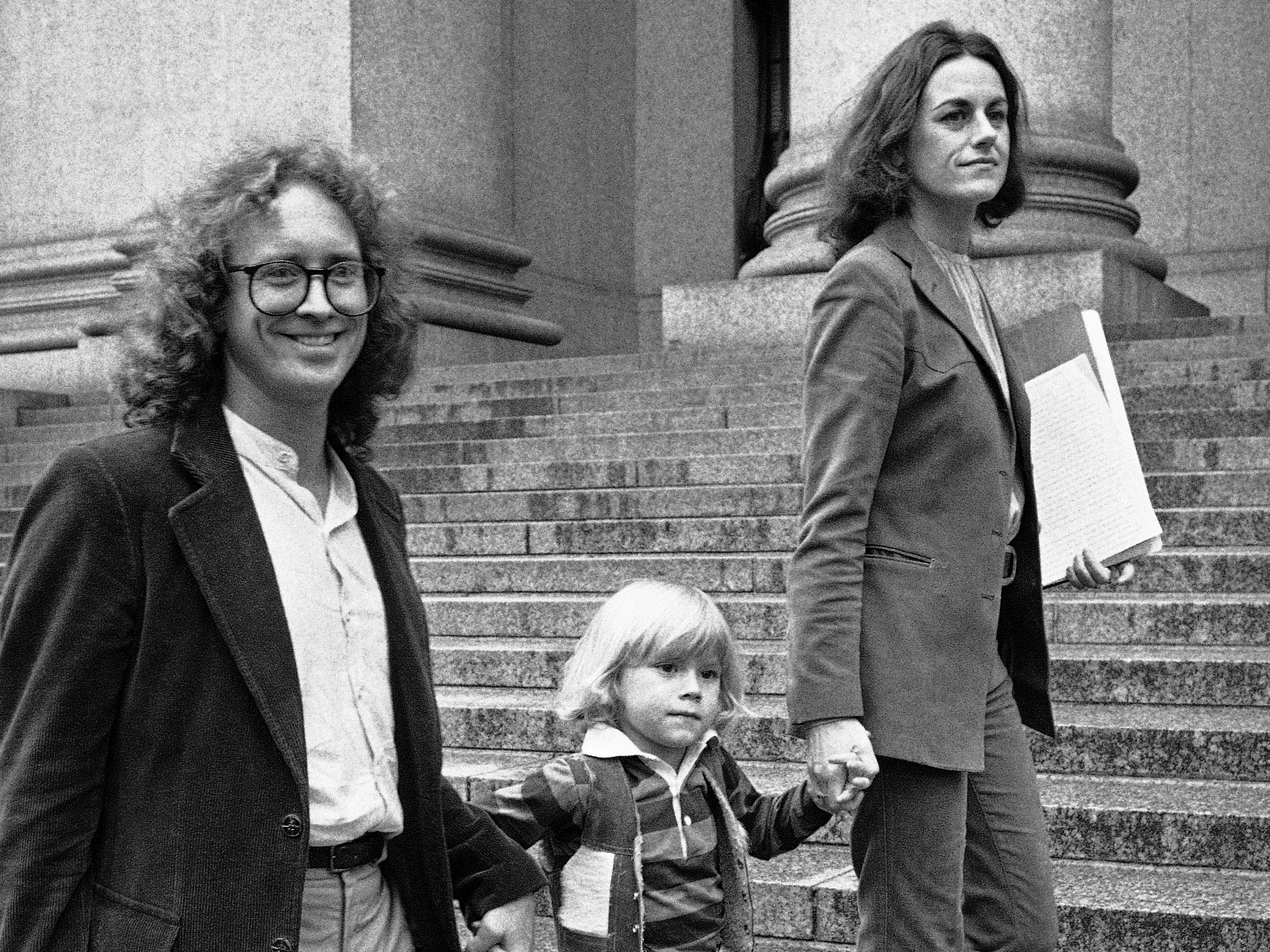 Zayd Ayers Dohrn walks with his parents Bill Ayers and Bernardine Dohrn outside the Federal Court Building in New York, May 17, 1982.